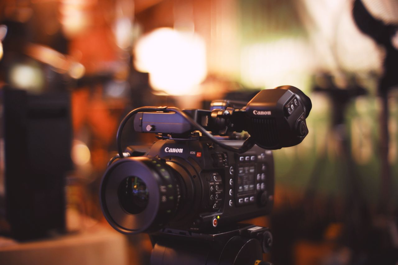 Crafting Captivating Headlines: Your awesome post title goes here Close-up of a professional video camera with selective focus in a studio setting.