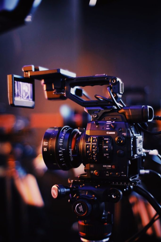 pexels-photo-2873486 Close-up of a professional video camera setup indoors, capturing high-quality footage.